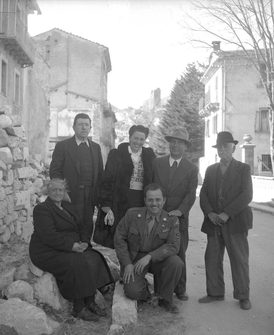 Gilbert DiLoreto kneeling at center with relatives in Alfedena in 1946